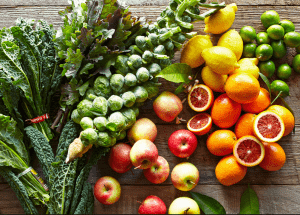 a group of fruits and vegetables on a wood surface Healthy Weight Loss Diets Westbury
